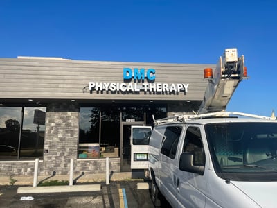 DMC PHYSICAL THERAPY POLE SIGN